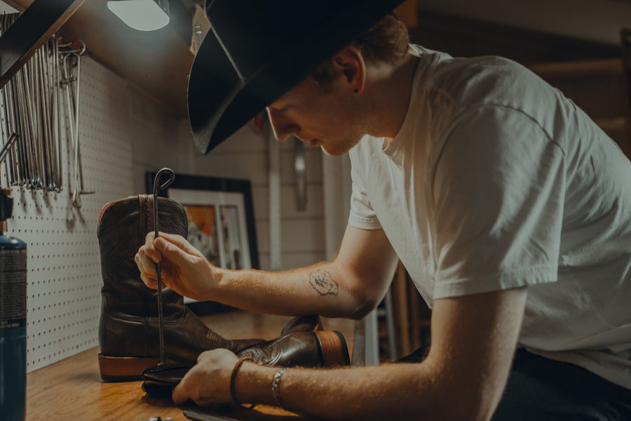 Close-up of a cowboy boot being branded at Chisos HQ